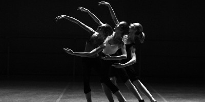 Three dancers performing onstage - Drama, Music and Performance